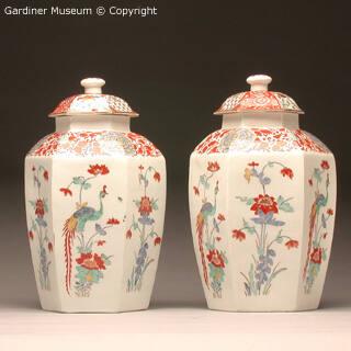 Pair of covered hexagonal jars