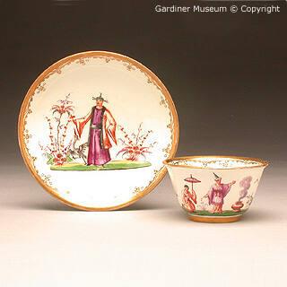 Tea bowl and saucer with chinoiseries