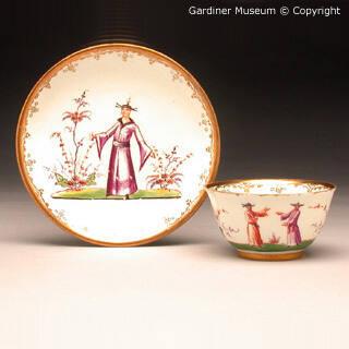 Tea bowl and saucer with chinoiseries