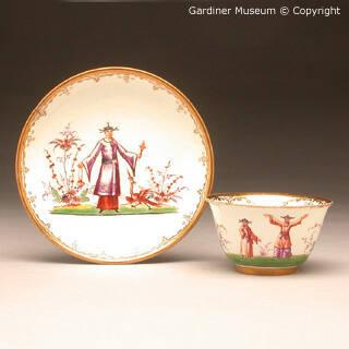 Tea bowl and saucer with chinoiseries