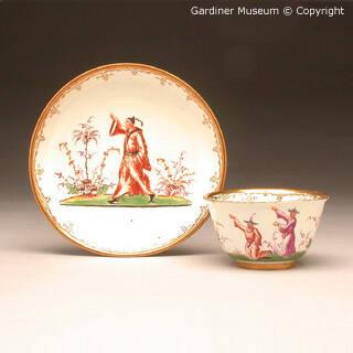 Tea bowl and saucer with chinoiseries