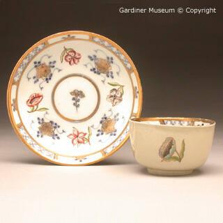 Tea bowl and saucer painted in the F.J.Ferner workshop