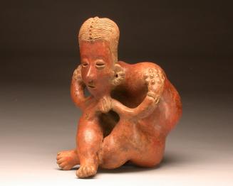 Figure of a Seated Hunchback