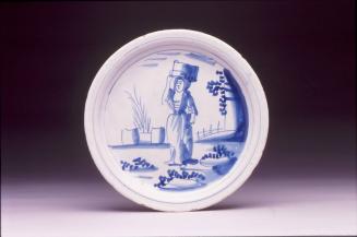 Plate with woman supporting a bucket