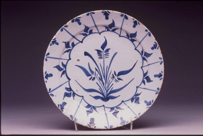 Plate with stylized foliate design