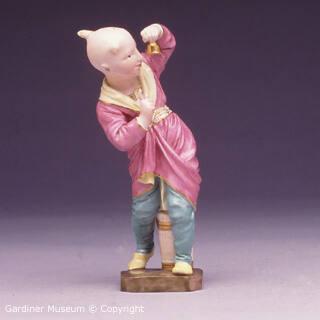 Figure of a boy in Chinese dress