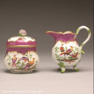 Sugar bowl and milk jug with exotic birds