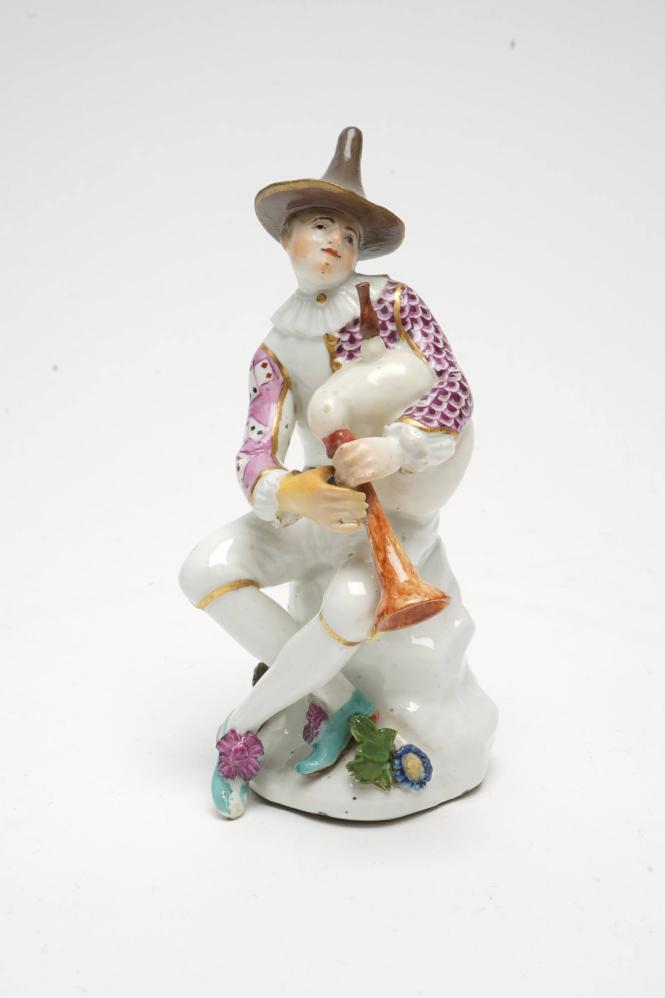 Harlequin with bagpipes