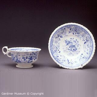 Cup and saucer with passion flowers