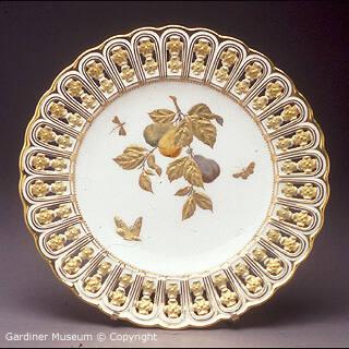 Pierced dessert plate with fruit motif